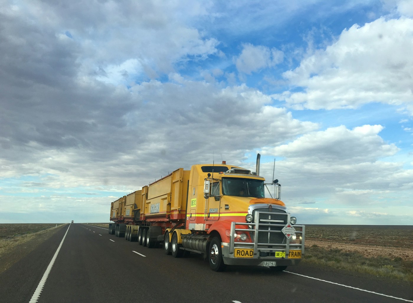 A freight truck travelling on an open highway in South Australia.